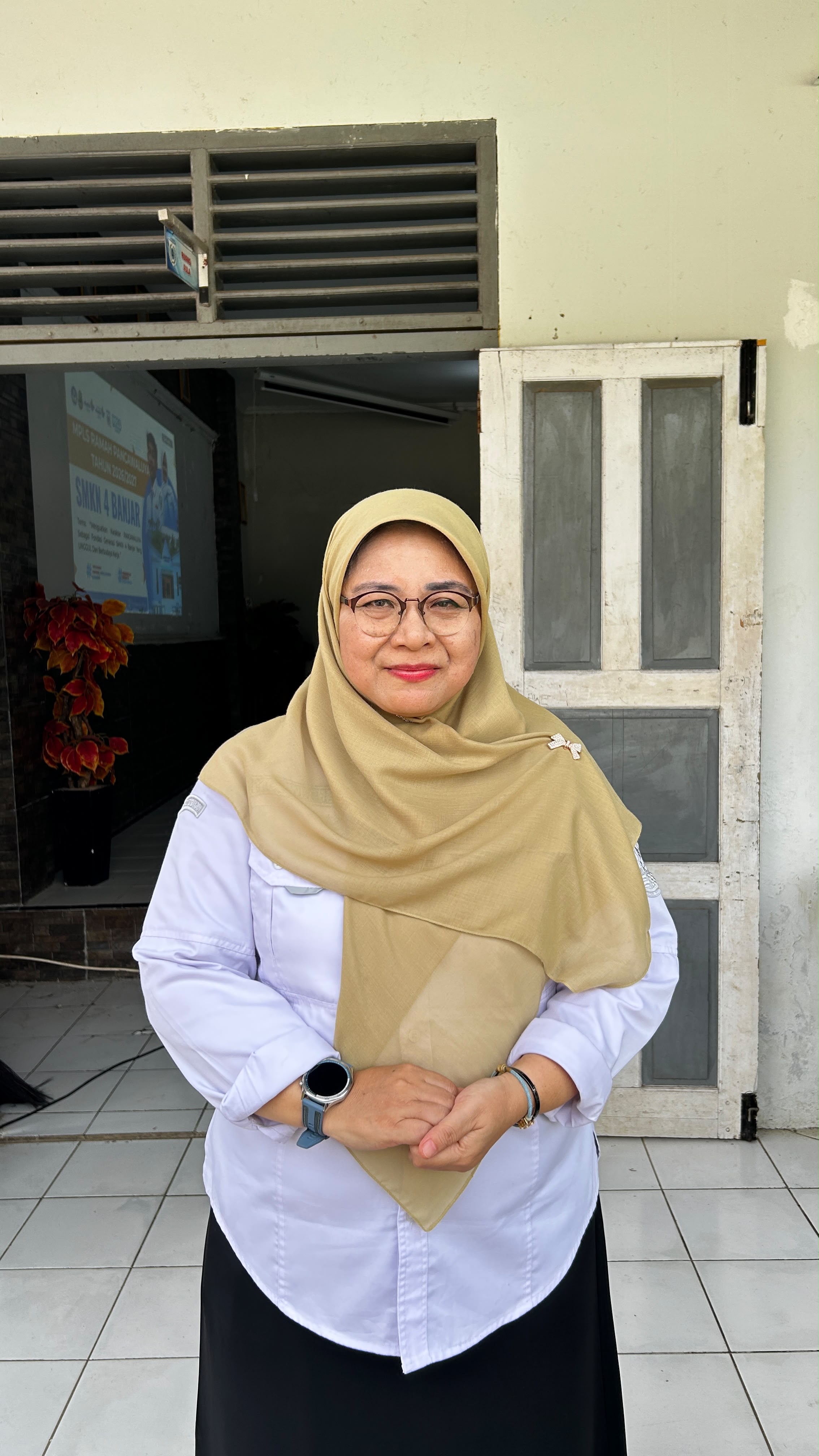 Tina Nurhayati,A.Md.,S.Pd.,M.M.Par.